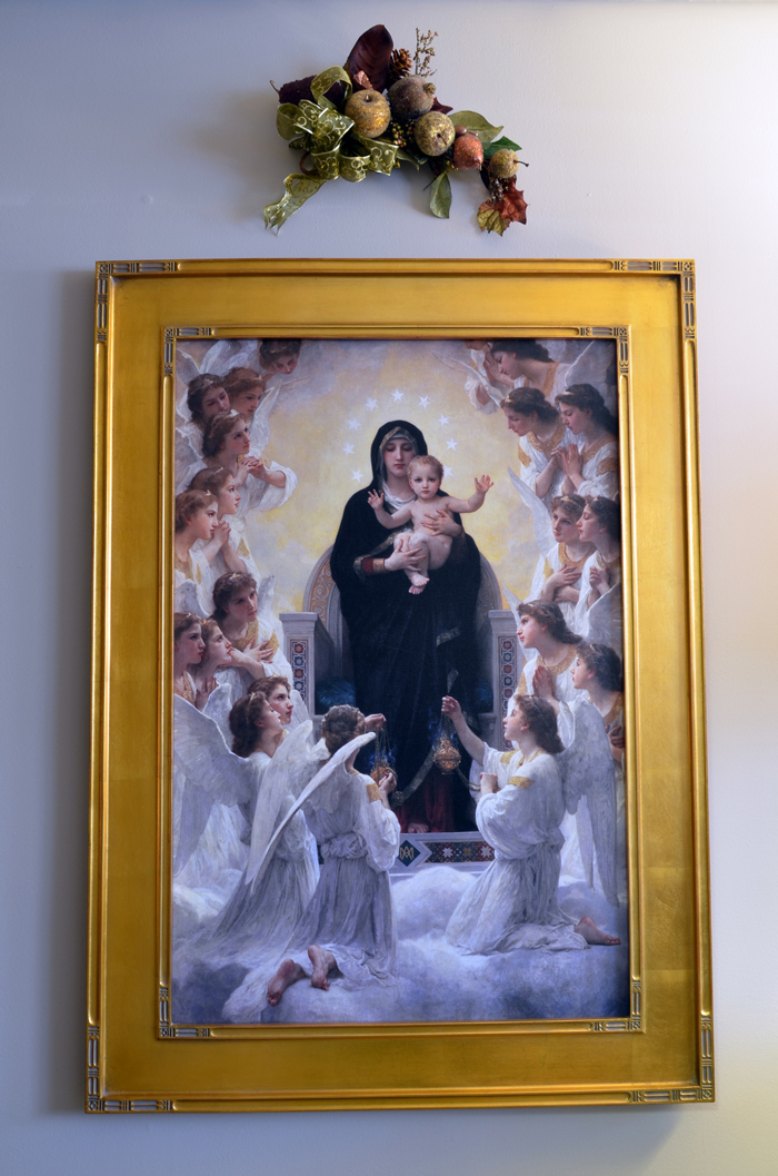 Painting of The Madonna and Child from inside Karen's office. Karen sees her talent as a gift from God to help her serve humanity