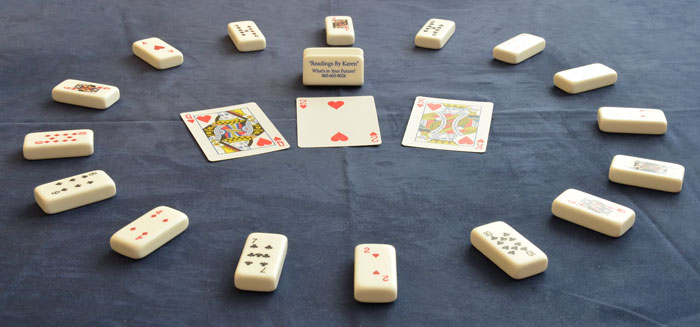 Playing cards and titles set on Karen Hollis' Reading Table