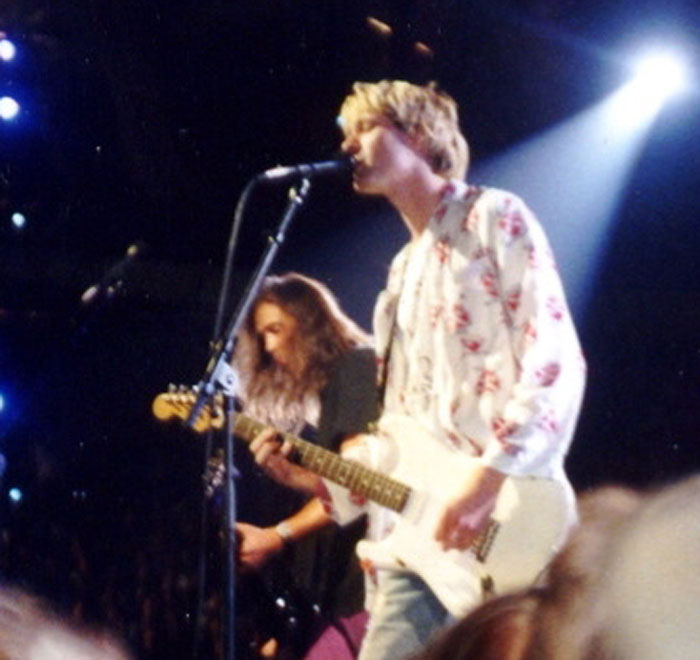 Kurt Cobain playing with Nirvana around 1992 - this image is from the Wikimedia Commons and the copyright is in the public domain.