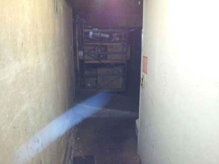 Photograph from bar basement showing a streak of blue light that cannot be explained